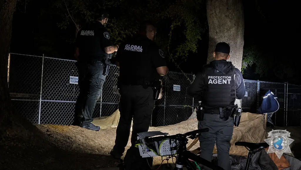 GPI officers checking a fence line at night in Sacramento