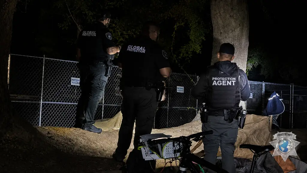 GPI Global Protection SRT agents conducting nighttime field operation at fenced perimeter in Sacramento CA